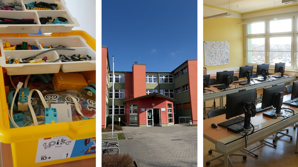 Gelbe Lernmaterialbox, rotes Schulgebäude und Computerarbeitsplätze unter blauem Himmel in Sachsen—moderne Ausstattung im hellen Klassenraum.